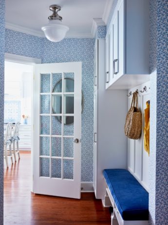 blue wallpaper, mudroom, custom cabinets, 